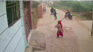 the-videoshows-a-woman-chasing-away-the-shooters-with-just-a-coconut-broom